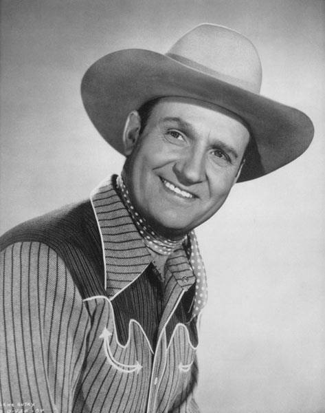 Gene Autry with an acoustic guitar